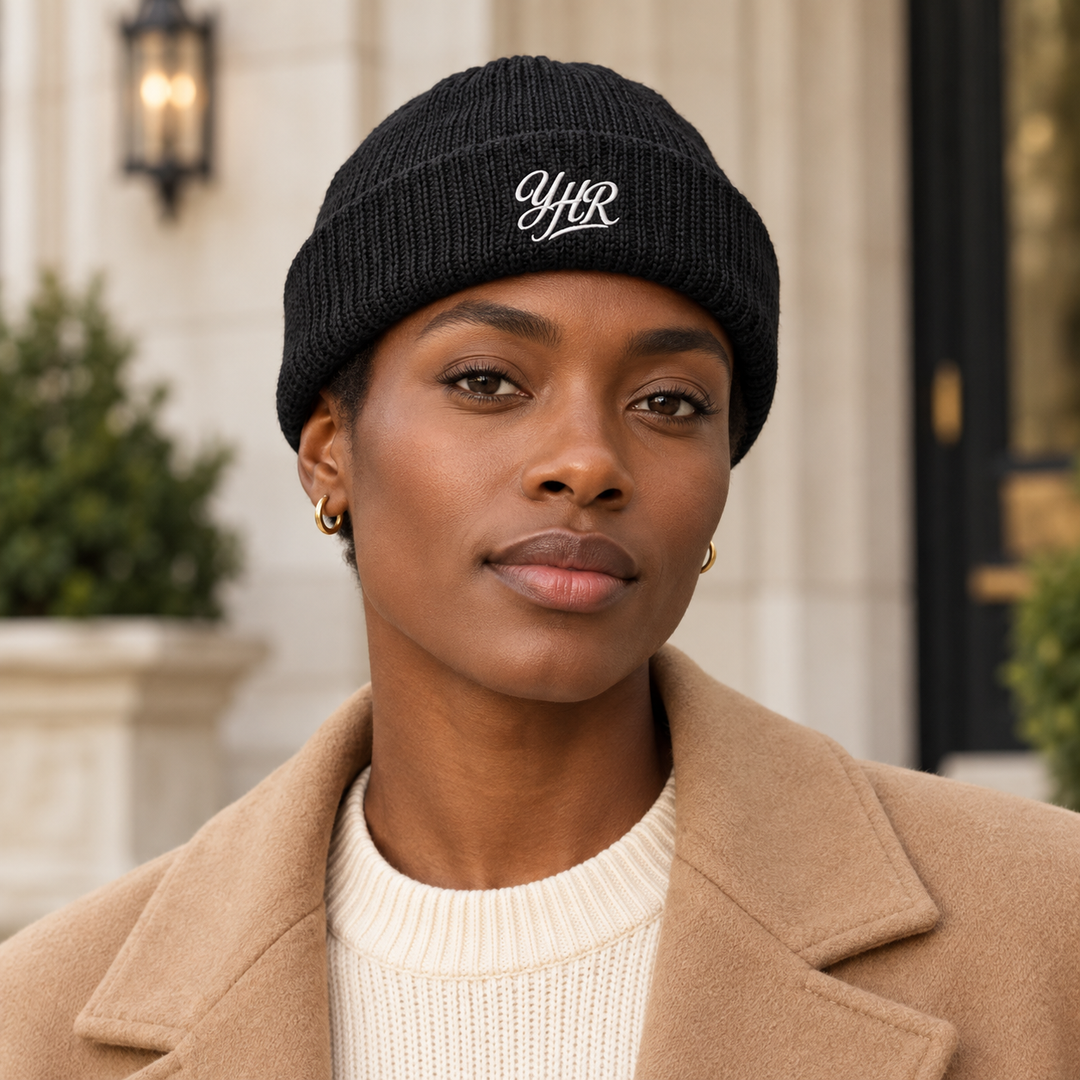 AI-generated lifestyle styling image of YHR Script Fisherman Beanie.