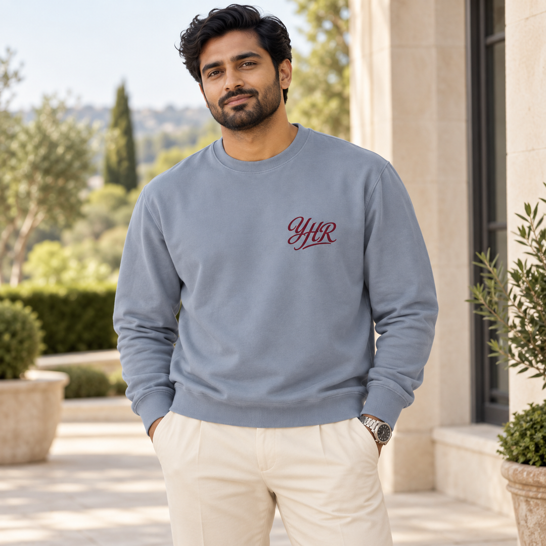 AI-generated lifestyle styling image of YHR Script Garment-Dyed Fleece Crewneck – Light.