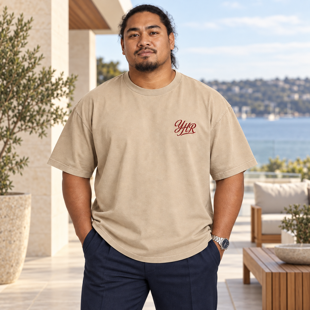 AI-generated lifestyle styling image of YHR Script Oversized Faded T-Shirt – Light in an upscale setting.