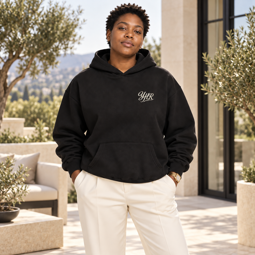 AI-generated lifestyle styling image of YHR Script Oversized Hoodie – Dark in an upscale setting.