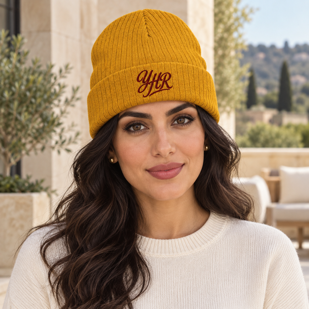 AI-generated lifestyle styling image of YHR Script Ribbed Knit Beanie – Color Collection.