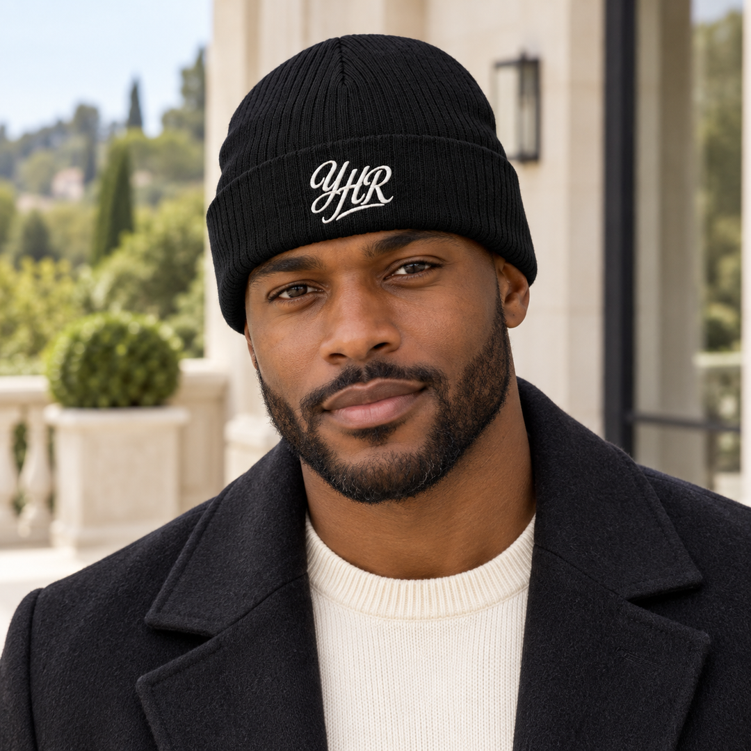 AI-generated lifestyle styling image of YHR Script Ribbed Knit Beanie – Neutrals.