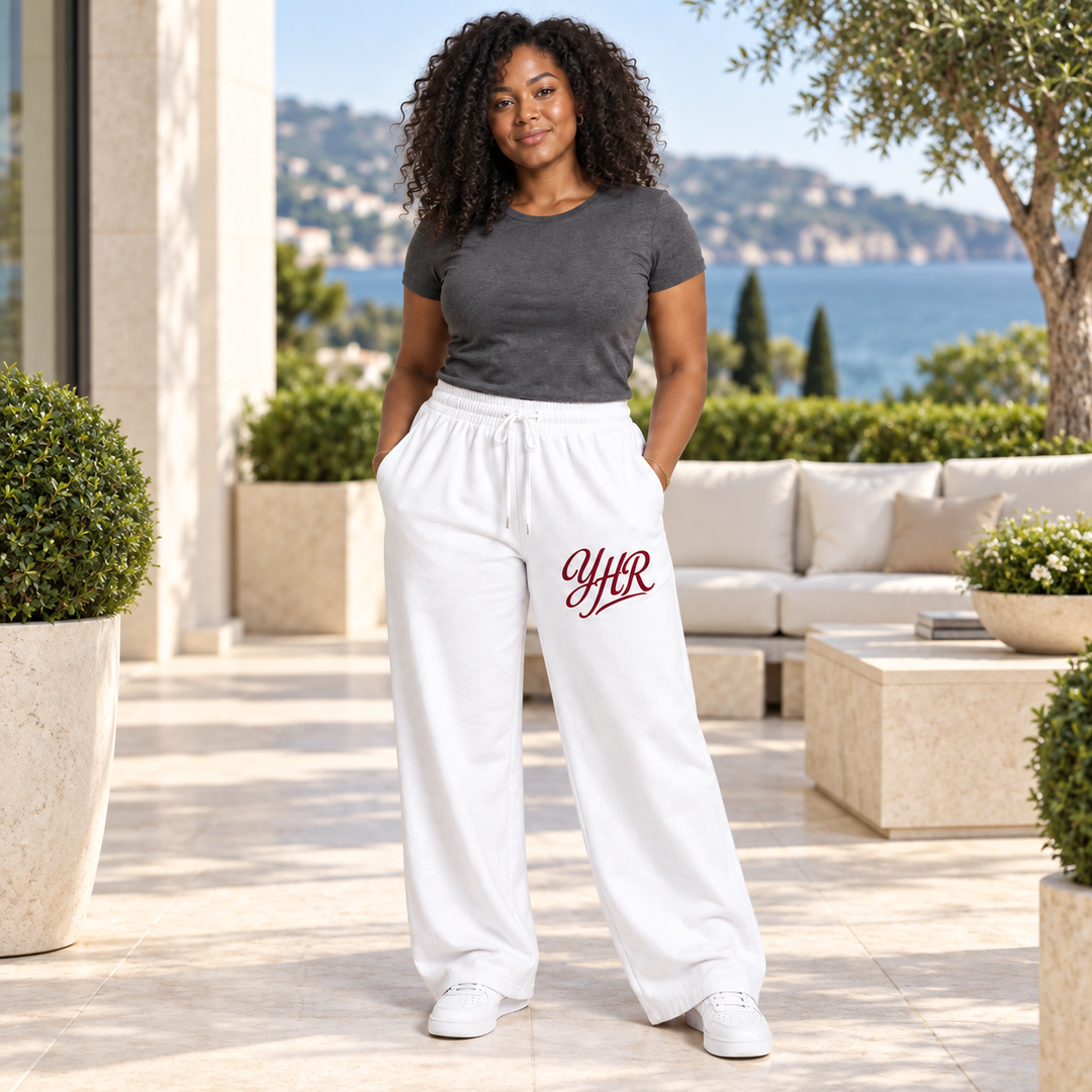 AI-generated lifestyle styling image of YHR Wide-Leg Pants in an upscale setting.