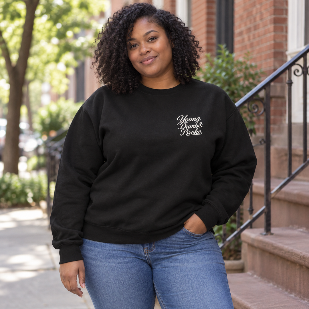 AI-generated lifestyle styling image of Young Dumb & Broke Classic Crewneck Sweatshirt – Dark.