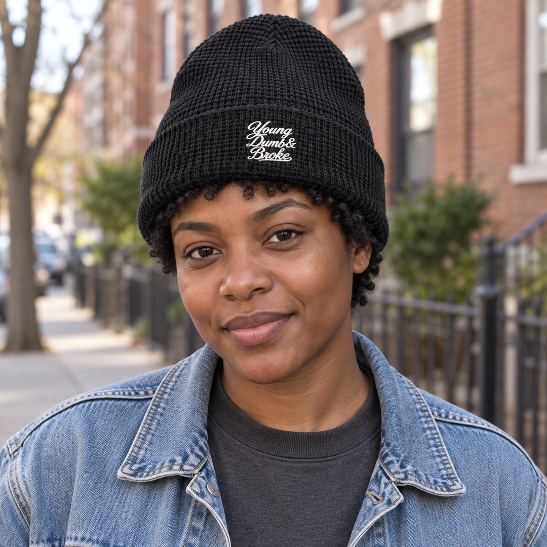 AI-generated lifestyle styling image of Young Dumb & Broke Waffle Beanie.